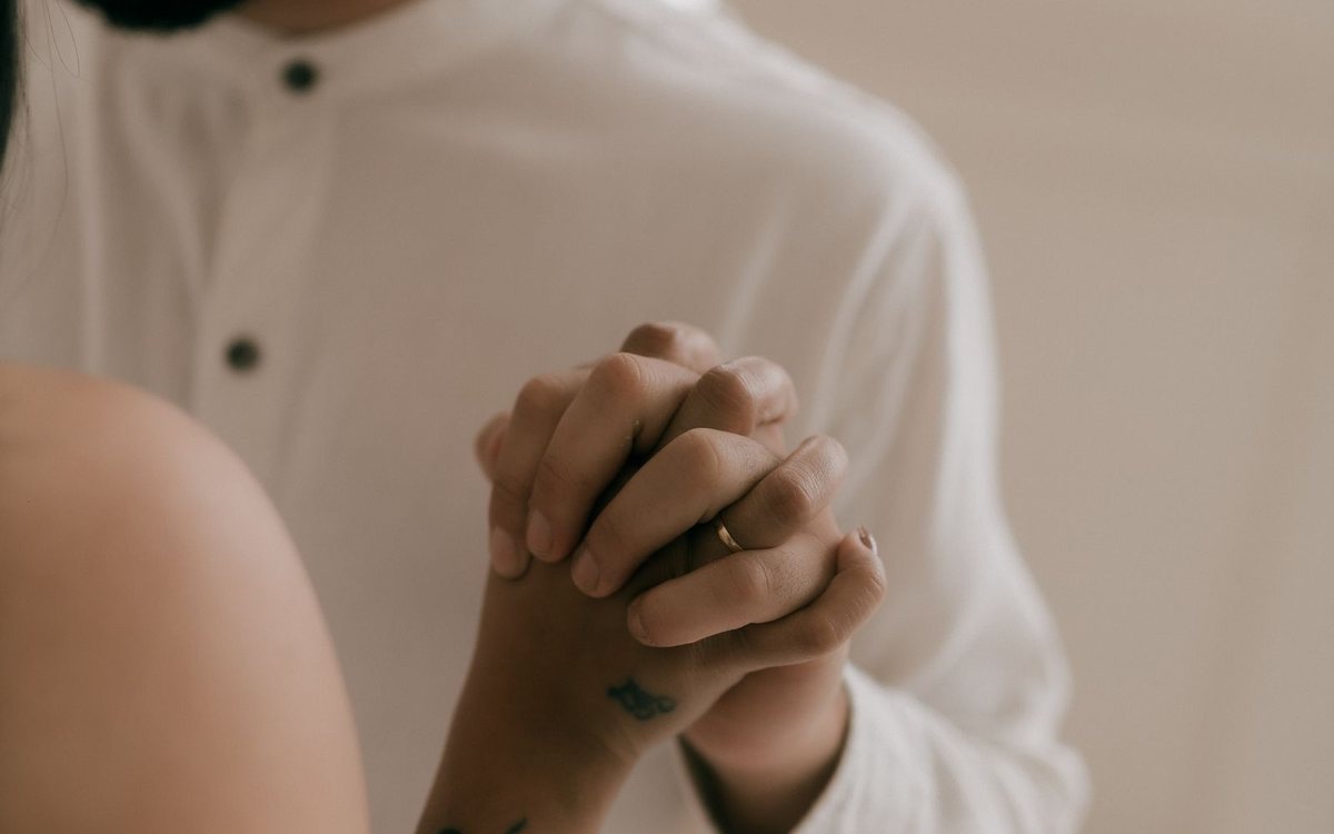A couple holding hands