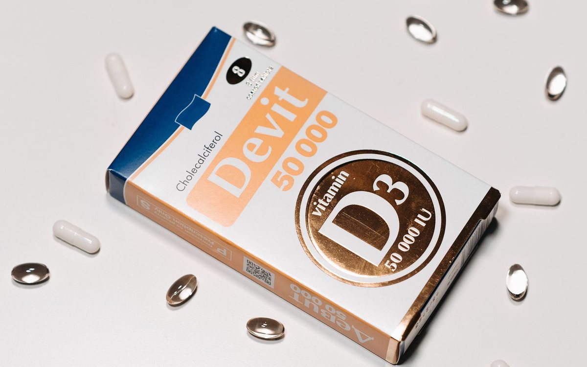 A box of vitamin D3 supplements with capsules